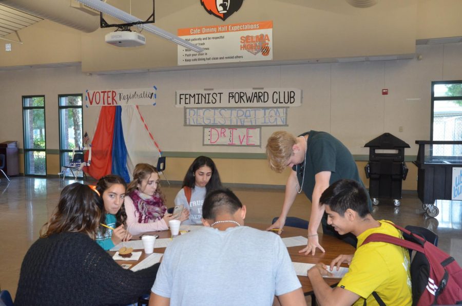 The Feminist Forward Club helps students register to vote.