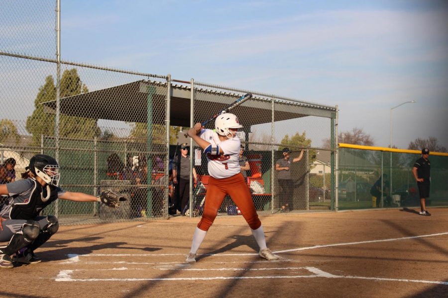 Genna Martinez winds up to hit the ball.
