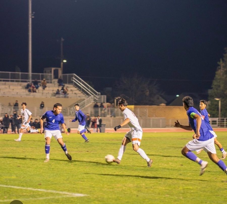 Varsity boys soccer defending home field  