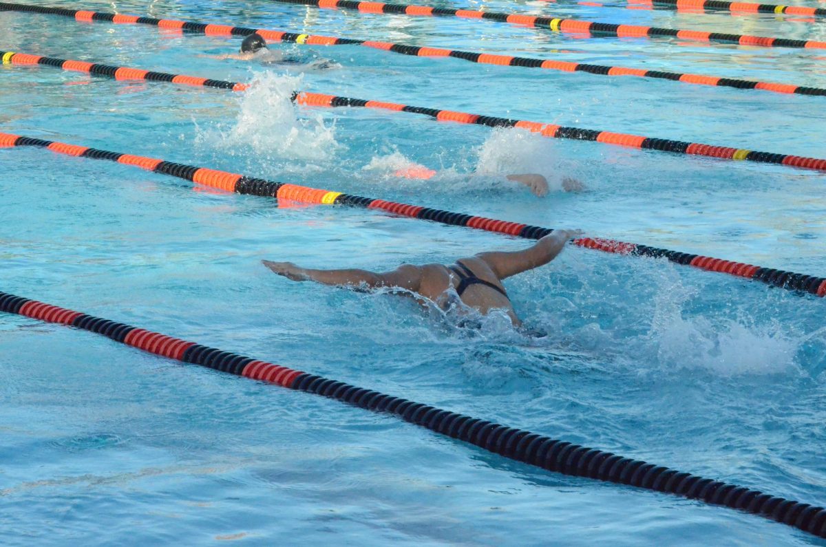 Junior varsity swimmer Destiny Aliza Rivera swimming gracefully in her meet