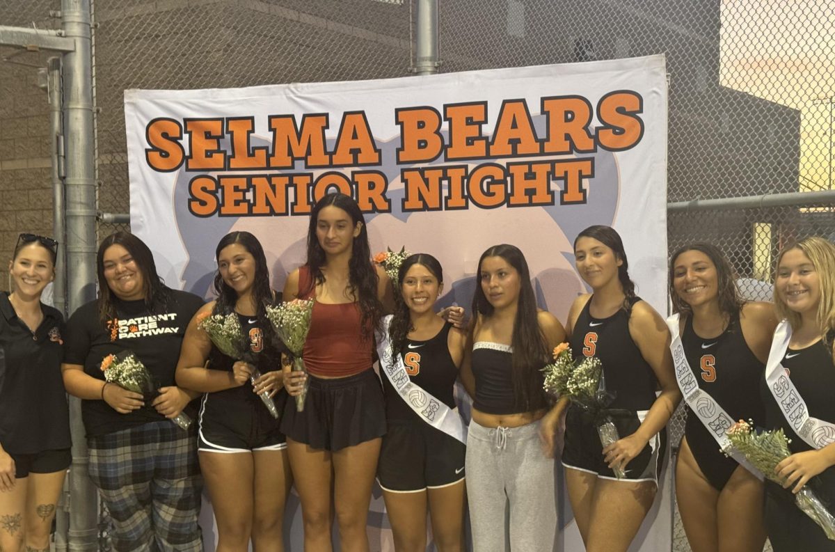 Water polo senior girls lined up after the ceremony of their senior night