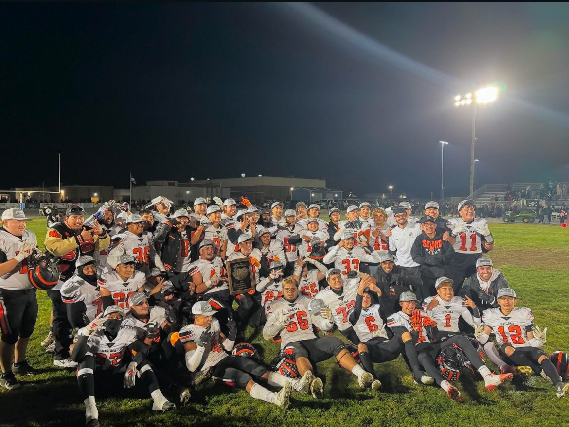 The Selma Bears’ varsity football team poses for a photo after winning the Division 5 Championship game against Morro Bay High, advancing to the state playoffs. 