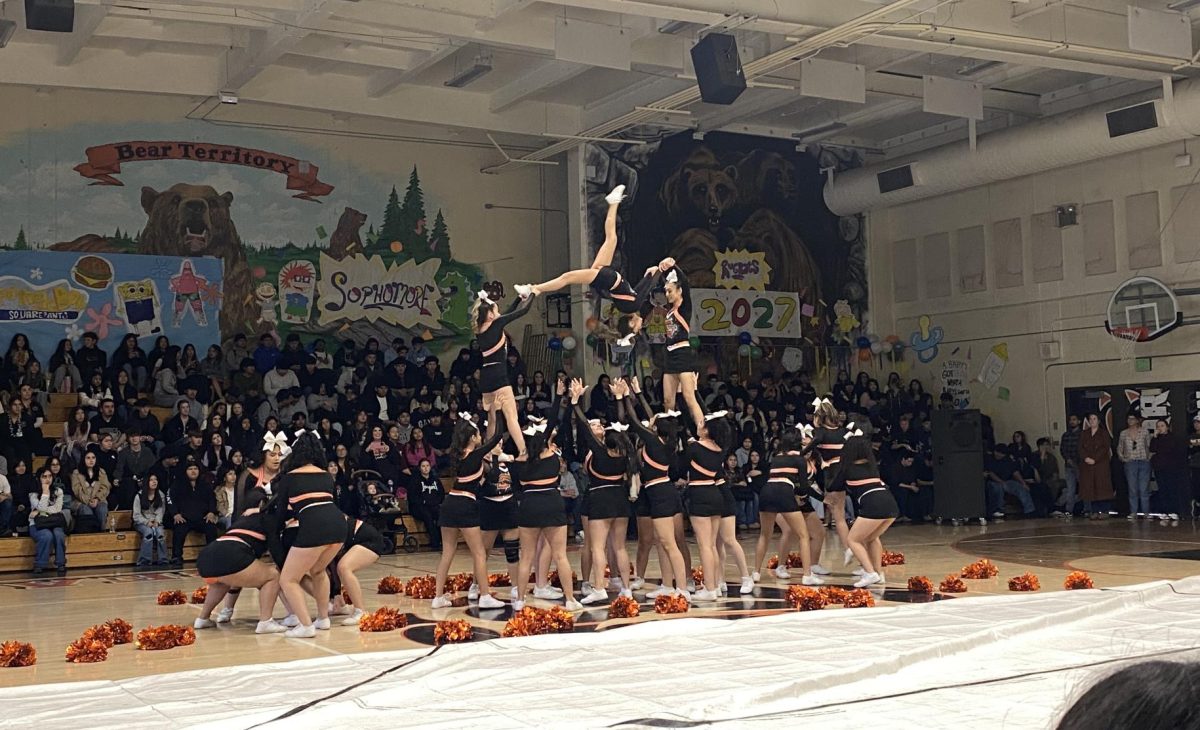 SHS Cheer Team doing a stunt at the Nickelodeon Rally