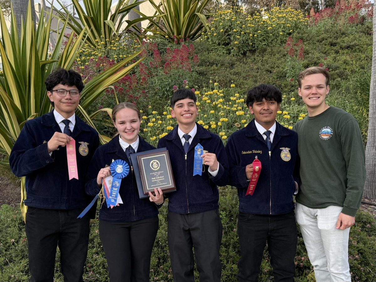 Elizabeth Fransen, Joaquin Aranda, Sebastian Valdez, Samuel Martinez, and Dale Fransen after the FFA State Finals for Agriculture Mechanics. 
