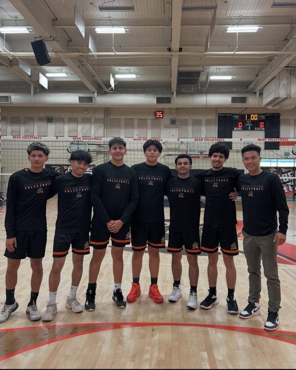 Selma boys’ volleyball seniors standing tall and proud with Coach Ly.
