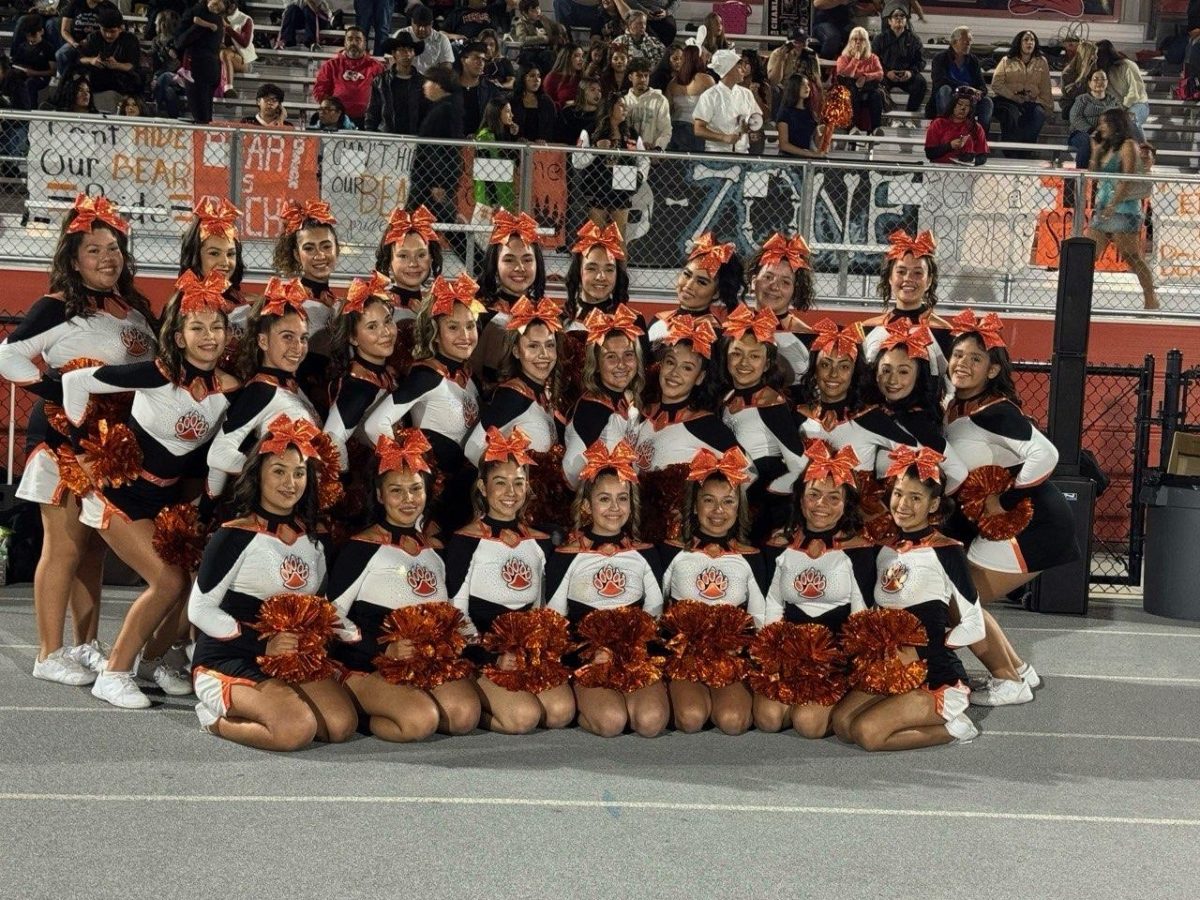 Selma High Varsity Cheer gathered together for a photo during the Rivalry Game of Selma vs. Kingsburg.
