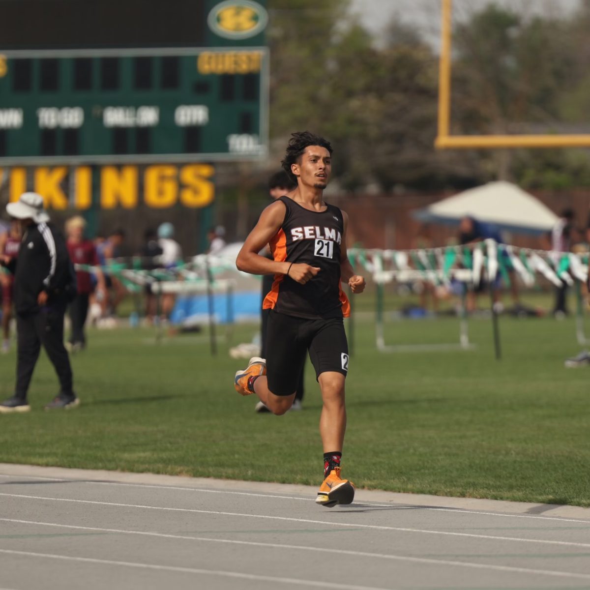 Brandon Zarr is running on the Kingsburg Track.