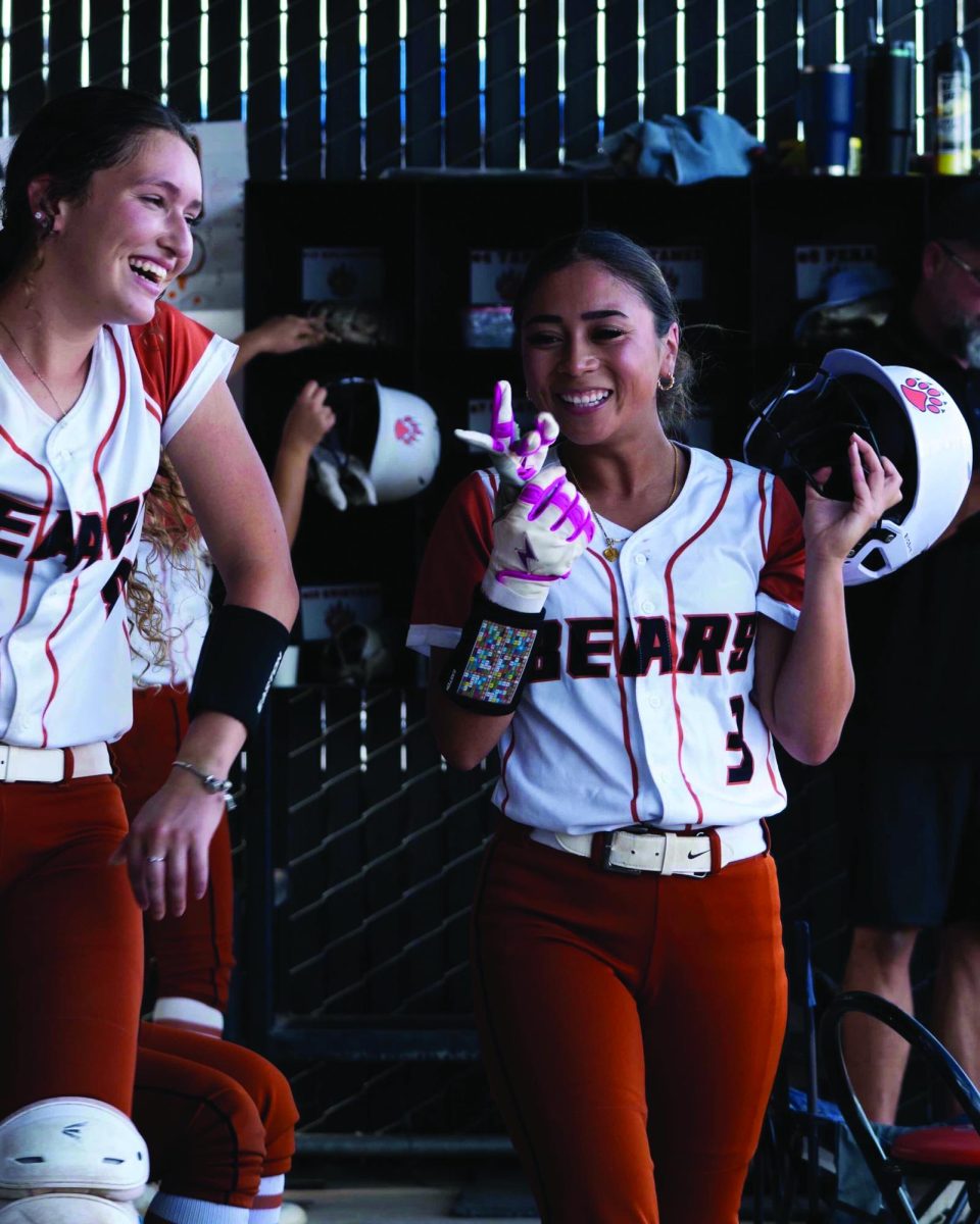 Jayleen Sisavanh laughing with Alia Tamez after scoring