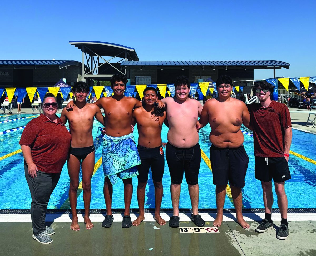 Varsity swim championship qualifiers